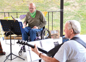 Musician friends meet for ‘Uke-a-Rama Llama Ding Dong Day Y’all’