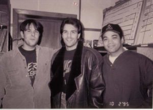 Tai Irwin with quarterback Doug Flutie and WFNX Program/Music Director Troy Smith in 1990