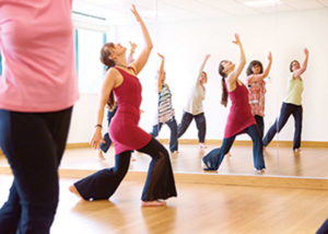 Susanne dancing using the Nia Technique. The Nia technique is a cardiovascular fitness practice set to music which blends dance arts, healing arts, and martial arts. 