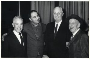 Rocky Marciano (second from left) stands with Former Boston Mayor John Collins and others. Photo via/Boston City Archives