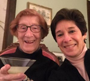 Jean Beddow-Arnth toasts her signature drink, Absolut Vodka Gimlet straight up, with Linda LeSage.