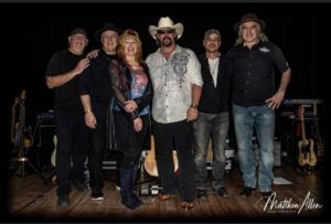 The Mychael David Project: (l to r) drummer Steve Kruglewicz, bassist Ed Lanzilotta, vocalist and percussionist Susan Jayne, vocalist and guitarist Mychael David, guitarist Jerry Prejean and keyboardist Glenn Stegner. 