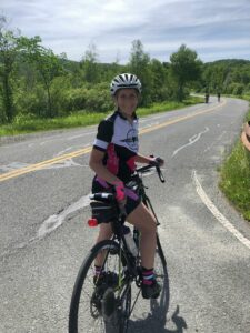  Kathleen MacNeil poses June 10, the first day of her trek, in Tyringham. 