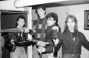 Gathered in the cellar/dressing room of Bunratty’s in Allston in the mid-1980s are The Fools’ bandmates (l to r) Joe Holaday, Mike Girard, Leo Black and Rich Bartlett. Photo/submitted