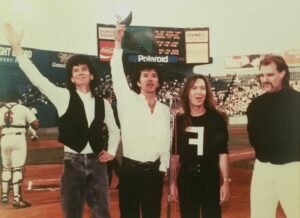 Singing the national anthem at Fenway Park prior to a Boston Red Sox game in the mid-1990s are The Fools’ bandmates (l to r) Joe Holaday, Mike Girard, Rich Bartlett and Jim Taft. Photo/submitted