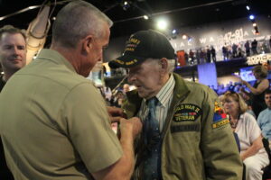 Alfred Consigli receives his French Legion of Honor medal.