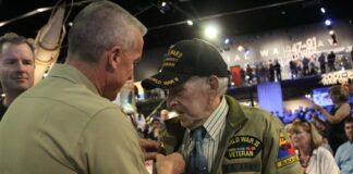 Alfred Consigli receives his French Legion of Honor medal.
