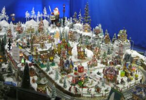The Christmas village in Bill Meagher’s model train display at the Massachusetts Horticultural Society in Wellesley’s annual holiday Festival of Trees event.  Photo/Janice Elizabeth Berte