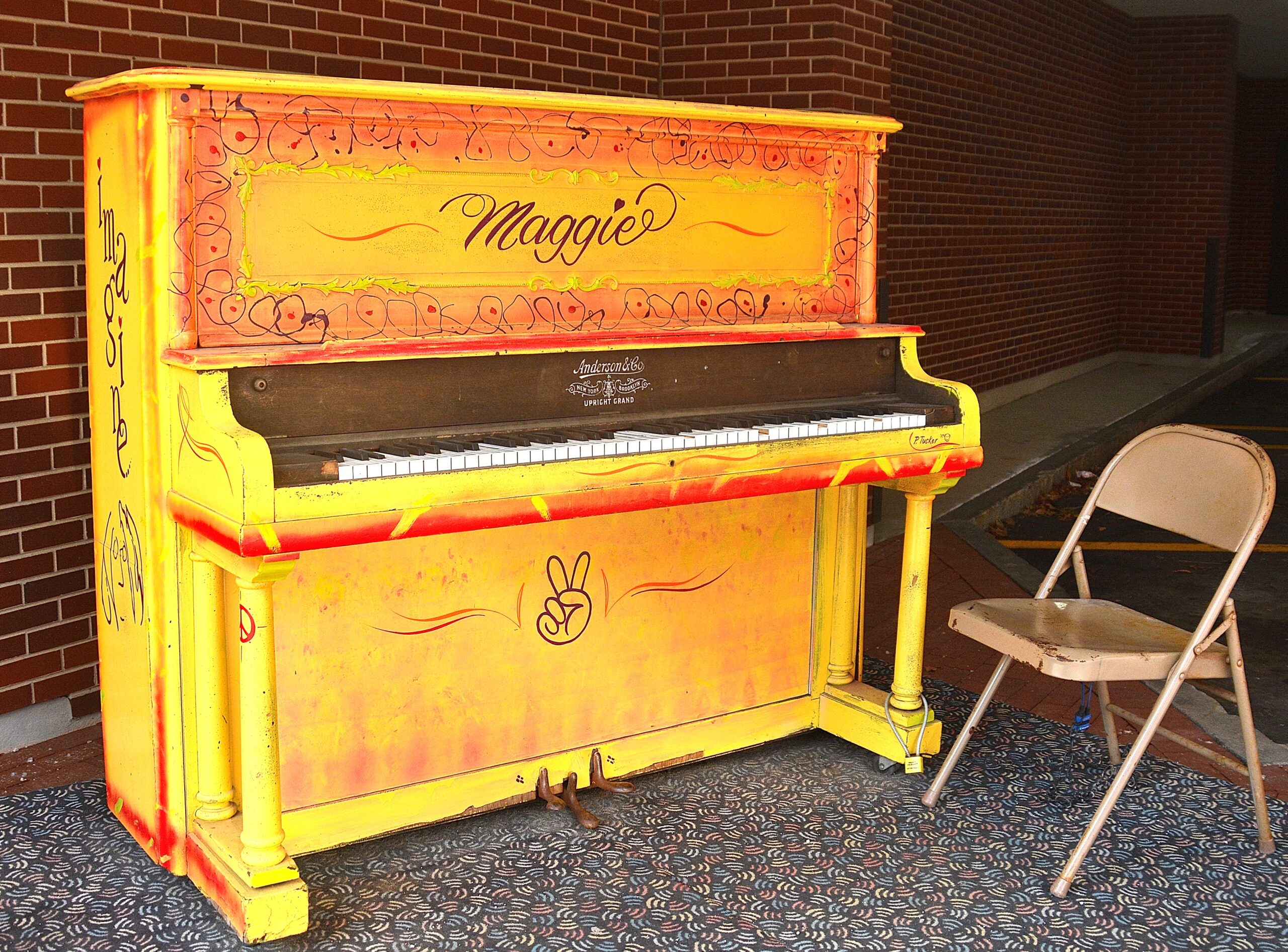 Piano painted by Paul Tucker at Avidia Bank’s Main Street location for several years beginning in 2016