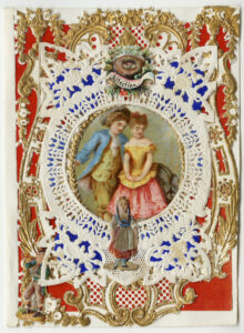 An elaborate card with paper and gilded lace from the New England Valentine Company, circa 1870.