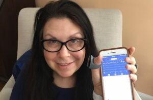 Robyn Gold of Framingham is monitoring and treating her sleep apnea, with her doctor’s approval, using a smart ring and phone app that measures her oxygen levels.