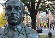 The statue of legendary politician James Michael Curley, the four-term mayor of Boston, is located right across the street from Boston City Hall. Photo/IrishHeritageTrail.com