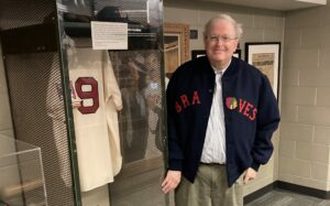 “I couldn’t have sat down and conjured a better job,” says Richard Johnson, of his role curating the collections and exhibits at the New England Sports Museum. Photo/Submitted