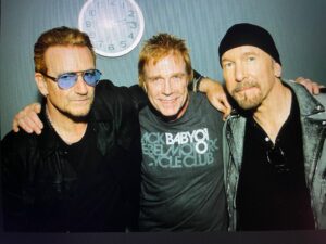 Carter Alan with Bono and The Edge of U2 in 2018―he was the first DJ in the U.S. to play their music, and went on to become good friends with them, travel with U2 on tour, and eventually write two books about the band.