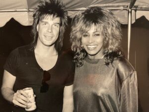 With Tina Turner at Great Woods in 1993, Alan jokes, “Neither of us were wearing wigs.”