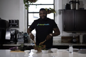 Spokesperson David Ortiz cooking a healthy meal.