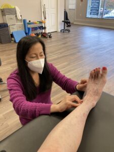 Ashland physical therapist Elaine Hays conducts an initial foot flexibility assessment to determine a patient's range of motion.Photo/Submitted
