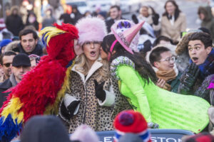 As Harvard University’s 2023 Hasty Pudding Woman of the Year, actress Jennifer Coolidge led a parade through Harvard Square in Cambridge on February 4. Photo/Jon Chase/Harvard University