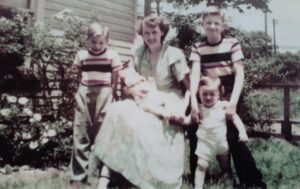 Esther Folkes with her sons Jack, Warren Jr., Kenneth, and Donald