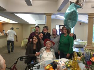 Esther Folkes poses with Hudson Senior Center staff at her 104th birthday celebration on May 5 at Peter’s Grove. 