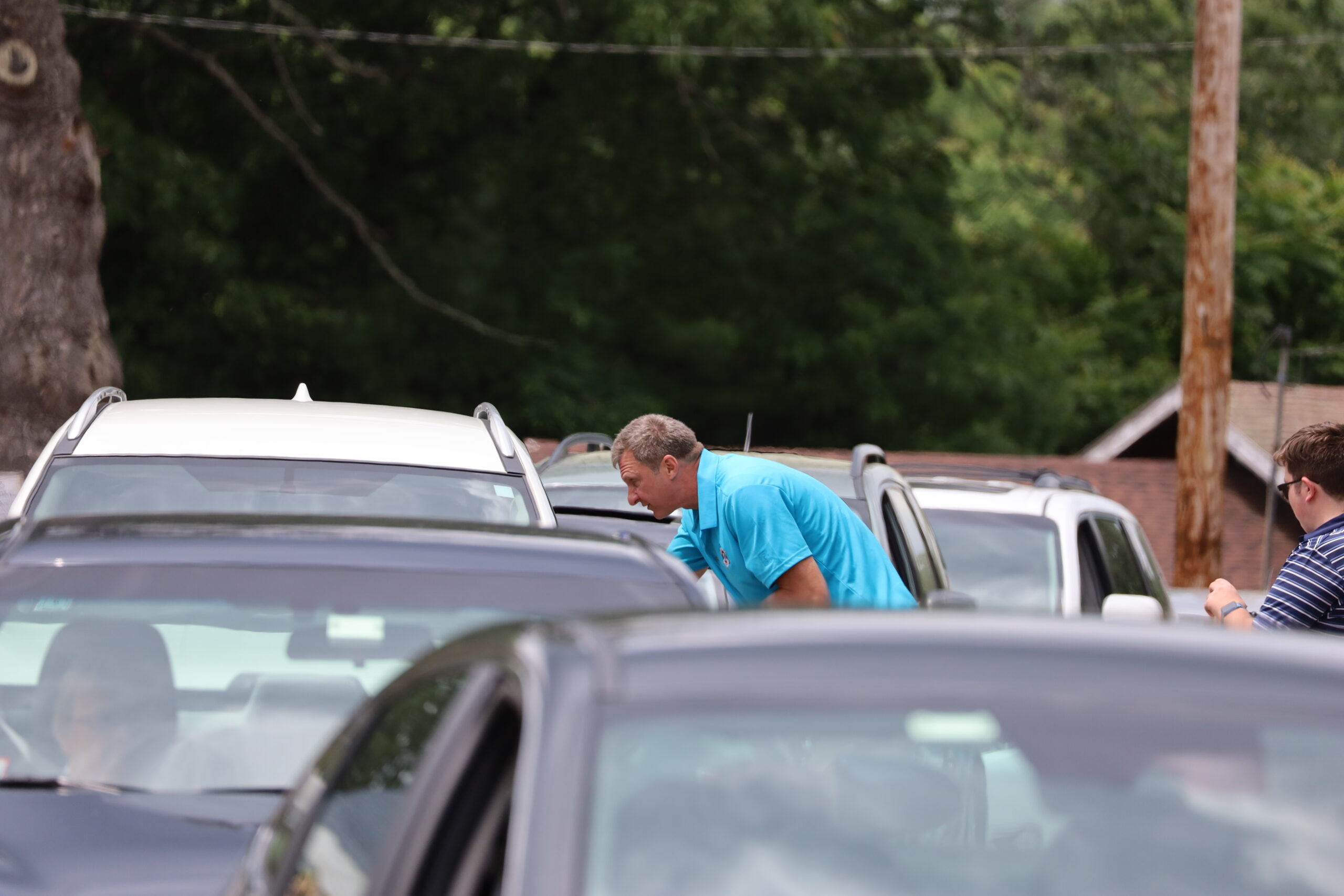 Worcester County Sheriff Lewis Evangelidis greets long lines of cars during the senior picnic on June 10. Photo/Evan Walsh