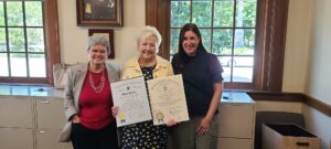 Wendy Mickel, center, with state reps. Kate Donaghue, left, and Hannah Kane, rightCourtesy Photo 