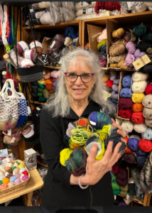 Lisa Lazdowsky, the owner of Elissa’s Creative Warehouse in Needham, had made her passion for knitting into both a career and a way of giving back to the community.

Photo/Matt Robinson
