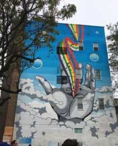 The “Spirit in the Sky" mural is located on this building at the corner of Exchange Street and Washington Street in Malden.