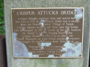 The Crispus Attucks Bridge, which crosses Cochituate Brook on Old Connecticut Path in Framingham, was dedicated with this plaque in 2000.Photo/Henry Stimpson

