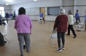 Mary Green’s chair yoga classes typically attract participants from 60 to over 90 years old.