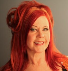 Kate Pierson of The B-52s on Cape Cod, promoting Kate's Lazy Cape vacation rental