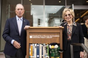 Michael Bloomberg and his sister Marjorie Tiven in 2022 at the dedication of the Charlotte and William Bloomberg Medford Public Library, which received a $3 million gift through the Bloomberg Philanthropies.Photos/courtesy of Bloomberg Philanthropies
