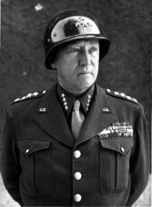 General George S. Patton in military uniform and helmet, World War II figure and Hamilton, Massachusetts resident