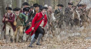 Special events across the state in 2026 will highlight Revolutionary War turning points, and the resilience and determination of everyday Massachusetts colonists like these militia reenactors.Photo/Courtesy of John Collins Photography
