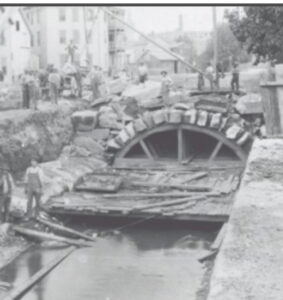 Blackstone Canal construction in Worcester, Massachusetts, showcasing canal lock and engineering challenges.