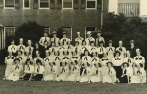 Women from Massachusetts colleges, like this WAVE decoding unit in Washington, DC in 1945, served as code breakers during World War II.