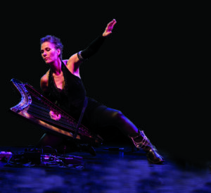 Deborah Henson-Conant, Grammy-nominated harpist and composer, performing with her harp.