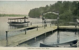 Lake Boon Landing sign and boat on the lake, Stow Massachusetts.