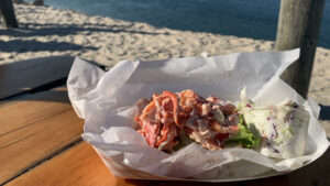 Lobster roll at Sesuit Harbor Cafe in Dennis, mid-Cape dining option for Fifty Plus Advocate readers.