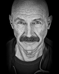 Tony Levin, Grammy-nominated bassist, black and white portrait by Juergen Spachman