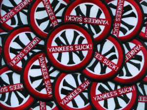 Pile of "Yankees Suck" patches sold at Fenway Park supporting Bridge Nine Records.