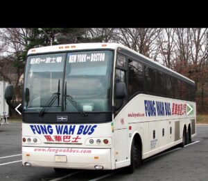 Fung Wah Bus service vehicle traveling between New York and Boston.