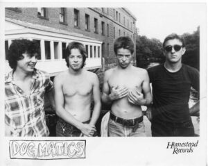 The Dogmatics band members in 1980s photo, Homestead Records logo.