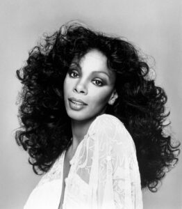 Disco legend and Boston native Donna Summer’s1983 hit single “She Works Hard for the Money” was inspired by meeting a ladies room attendant in a Los Angeles restaurant.Photo/Wikimedia Commons