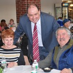 State Sen. Jamie Eldridge, D-Acton, mingles with guests Virginia Haskins of Boxborough and Benny Salvatore of Maynard during the luncheon of the 35th annual Senior Conference. Photo/Ed Karvoski Jr. 