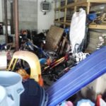 A garage in a state of clutter