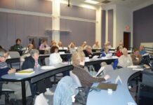 Adults inspired to continue education at Regis College program
