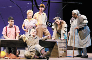 Margaret Ann Brady as Templeton (front) with Wheelock Family Theatre’s “Charlotte’s Web” cast