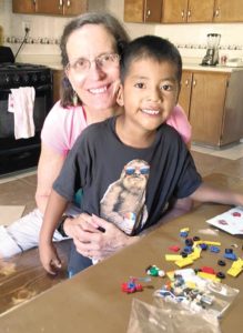 Mary Ann Judson with her sponsor child, Rene, 6