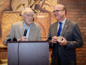 U.S. Rep. James McGovern presents the Congressional Gold Medal to Edward Daly.